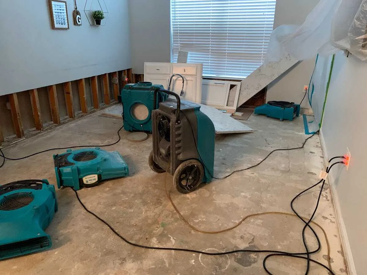 Dehumidifier in flood-cut room for Water Damage Restoration in Richland